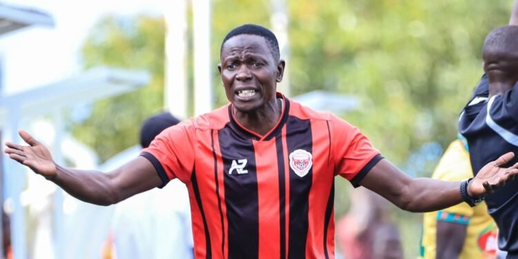 Eyali omuzannyi wa Uganda Cranes Hassan Mubiru anoonya buyambi – alongoosebwe eviivi