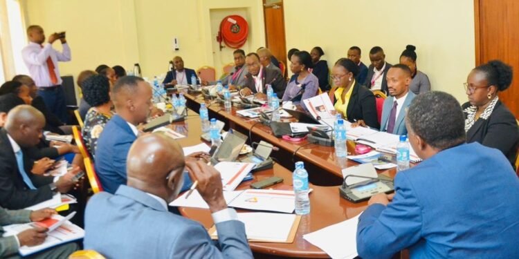 Bannekolera gyange baddukidde mu parliament ku nkola ya digital stamps ebanyigiriza – amakolero agasoba mu 30 galemereddwa